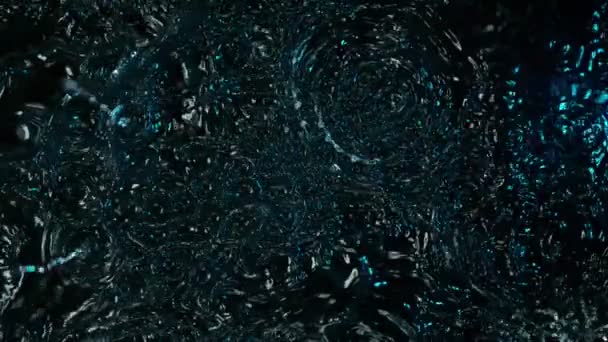 Water splashing on black background, super slow motion. Filmed on high speed cinema camera. — Stock Video