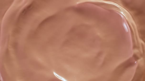 Light pink liquid swirling. Pastel background. Abstract make-up texture — Stock Video