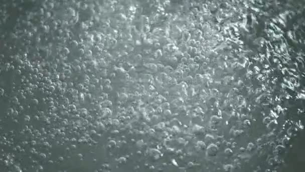 Close-up of boiled water, slow motion. — Stock Video