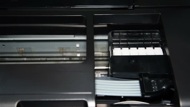 Continuous Ink Feed Printer Printing Photo. Close Up — Stock Video