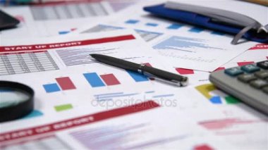Menkul Kıymetler Borsası istatistikleri, Büyüteç camı, kalem ve tablo Mali rapor