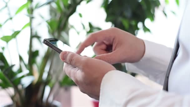 Trader Using Smartphone With Graphs And Charts On Screen — Stock Video