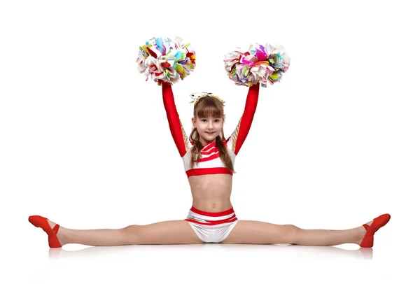 Cheerleading-Mädchen sitzt auf Spagat — Stockfoto