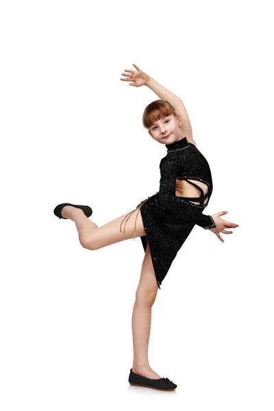 Chica en un vestido negro bailando — Foto de Stock