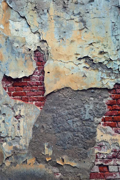 У віці, гранжева бетонна стіна з цеглою. Гломія, пустотливе відчуття. Неоднорідна текстурована поверхня. копіювання простору . — стокове фото