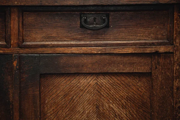 Detail of a vintage cupboard (sideboard) - drawers with metal handle. vintage retro furniture closeup. piece of furniture made of natural wood — Stock Photo, Image