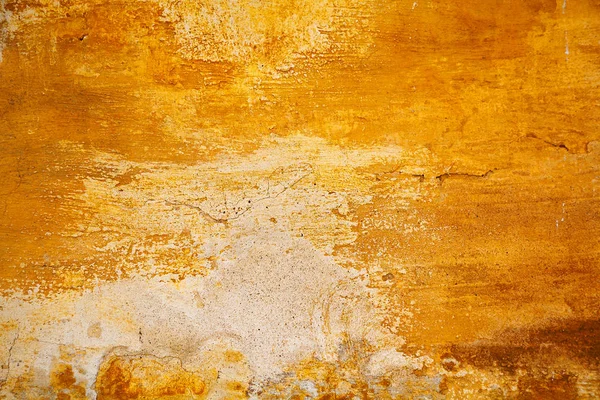 Lege ruimte. Versleten ruw oppervlak geel. Oude muur. Abstract oranje textuur — Stockfoto