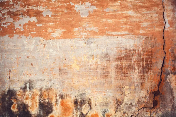 Achtergrond, oppervlakte vernietigd door de tijd en het weer. Oude muur met scheuren en krassen. Vintage textuur — Stockfoto