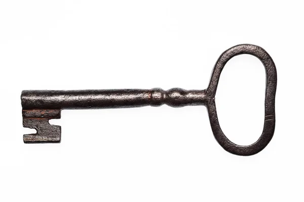 Vecchio arrugginito grande chiave isolato su sfondo bianco — Foto Stock