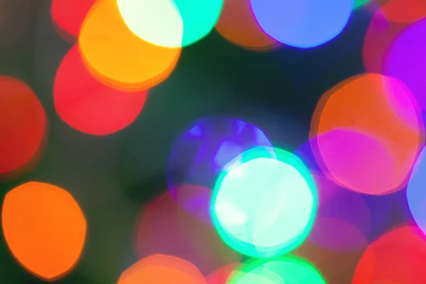 Πολύχρωμες κηλίδες φωτός. Defocused αφηρημένη φώτα διακοπές φόντο — Φωτογραφία Αρχείου