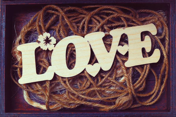 LOVE inscription, carved in wood. Vintage style — Stock Photo, Image