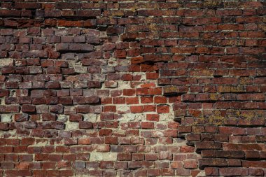 bazılarıda tuğla ile eski tuğla duvar. Arka plan doku kırmızı tuğla. Vintage tarzı. Alanı. Tasarımcı için arka plan. eski tuğla duvar duvar