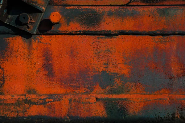 Background, texture for design. Rough metal surface with rust and orange paint — Stock Photo, Image