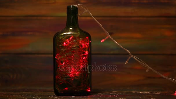 Decoraciones Para Año Nuevo Guirnalda Con Luces Intermitentes Dentro Botella — Vídeos de Stock