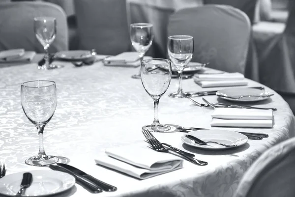 Interior of the restaurant. A set table in the restaurant, waiting for guests. Served table in restaurant