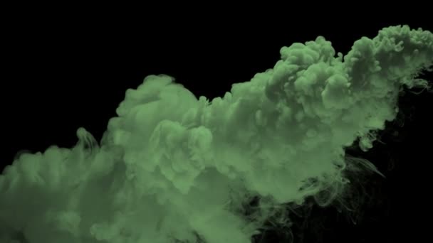 Lassú mozgás gomolygó zöld füst — Stock videók