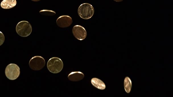 Slowmotion fallande pennies — Stockvideo