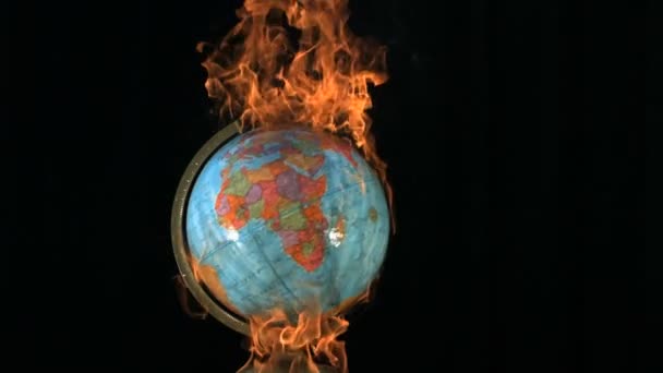 Slow motion globe on fire — Stock Video