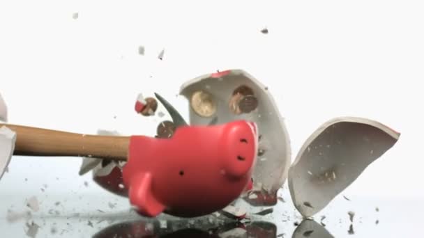 Slow motion smashing piggy bank — Stock Video