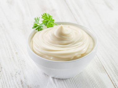 Natural mayonnaise ingredients and the sauce itself. clipart