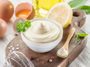 Natural mayonnaise ingredients and the sauce itself. clipart