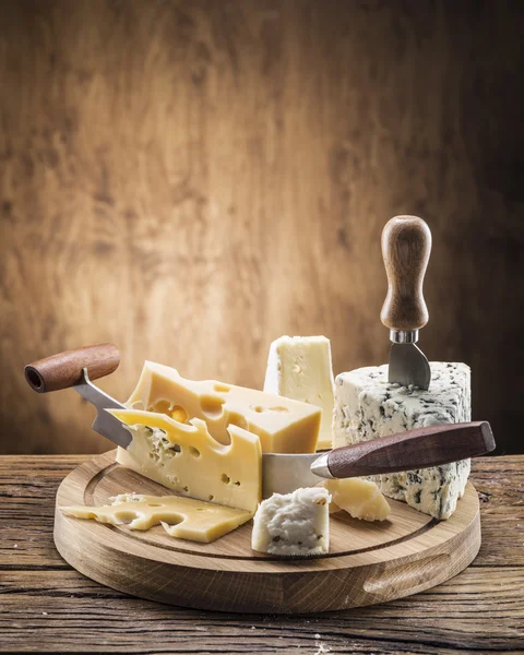 Variety of cheeses. Vintage stiles. — Stock Photo, Image