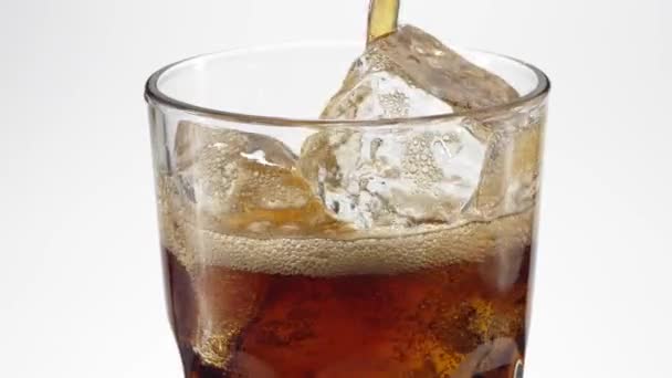 Slow-motion cola poured in a glass. — Stock Video