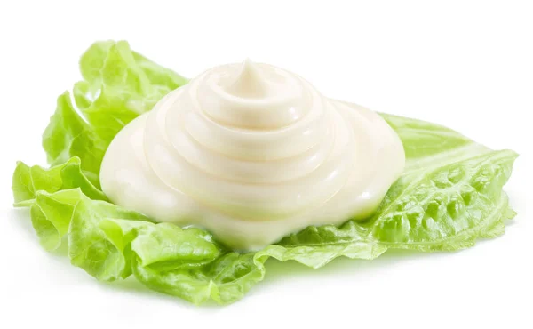 Natural mayonnaise sauce on the salad leaf. — Stock Photo, Image