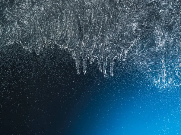 Wooden sill and frozen window. Christmas or New Year background. — Stock Photo, Image