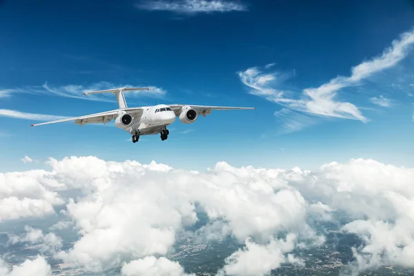 Airplane over the clouds. — Stock Photo, Image