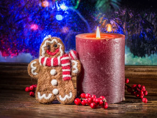 Gift boxes, candle lights and frozen window. Christmas backgroun — Stock Photo, Image