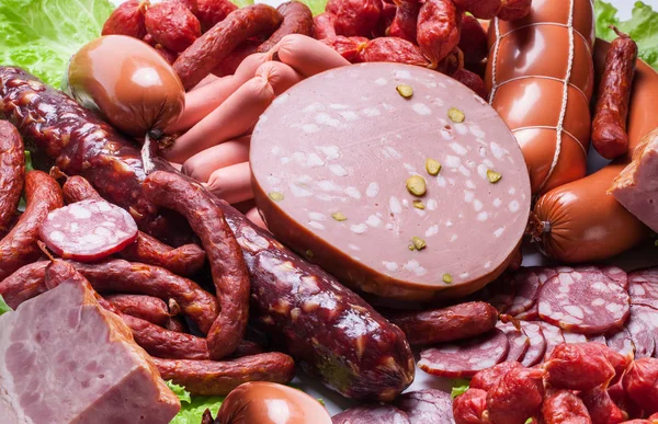 Variety of sausage products and meat. — Stock Photo, Image