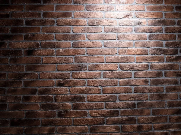 Темно-коричневая кирпичная стена . — стоковое фото