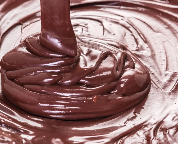 Cioccolato fuso o glassa di cioccolato . — Foto Stock