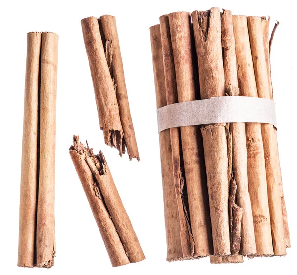 Cinnamon barks or sticks - popular asian spice isolated on white — Stock Photo, Image