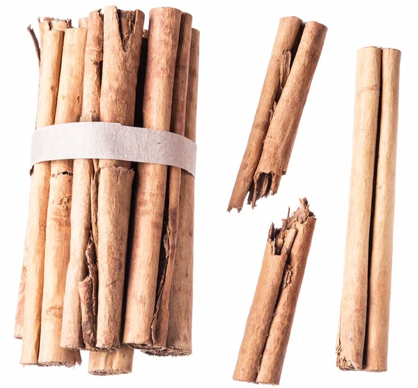 Cinnamon barks or sticks - popular asian spice isolated on white — Stock Photo, Image