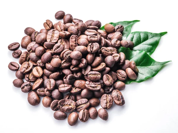 Roasted coffee beans and leaves on white background. — Stock Photo, Image