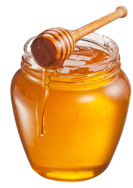 Nádoba plná čerstvého medu a naběračka medu. Soubor obsahuje ořezové — Stock fotografie