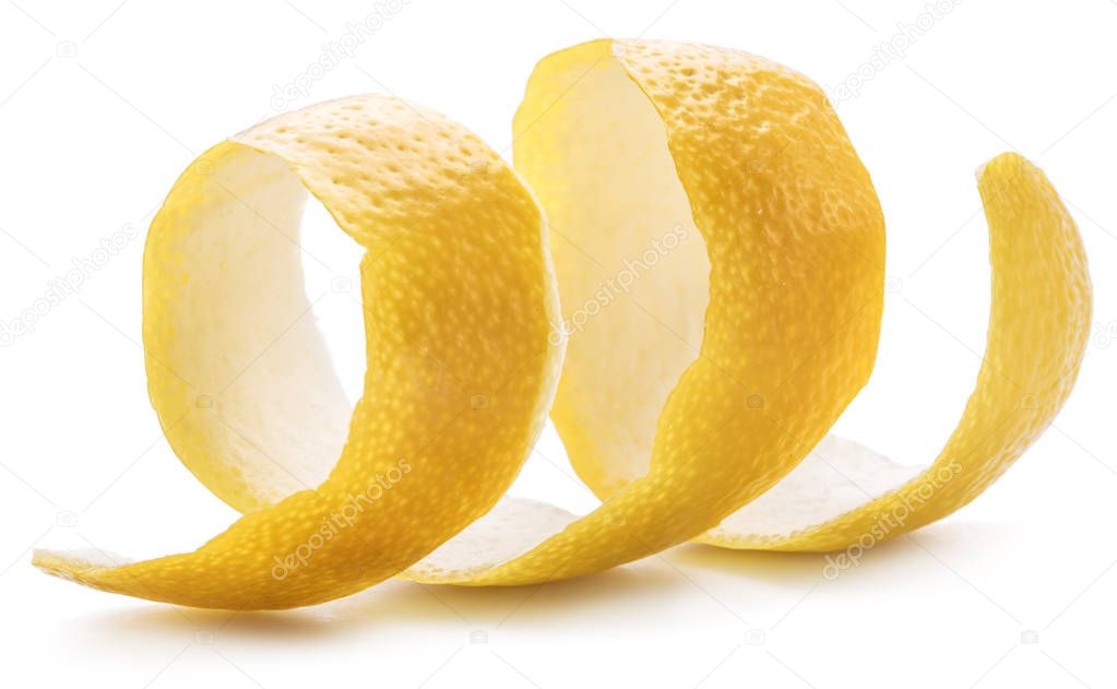 Lemon peel or lemon twist on white background. Close-up.