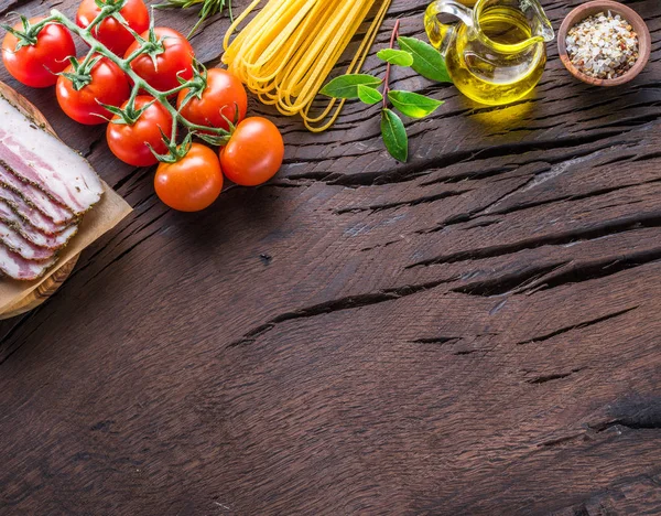 Variety of food on the wooden table. Top view. — Stock Photo, Image