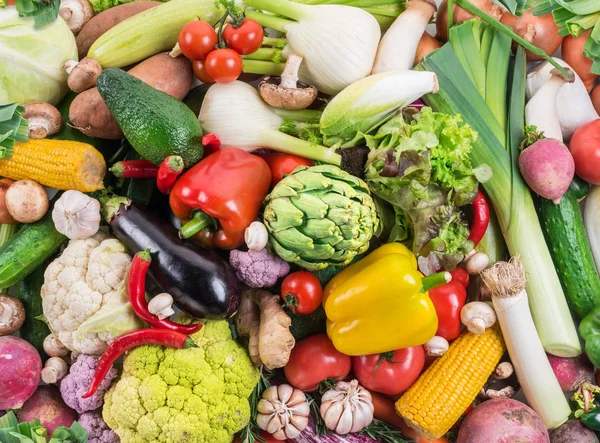 Legumes orgânicos diferentes. Fundo alimentar multicolorido . — Fotografia de Stock