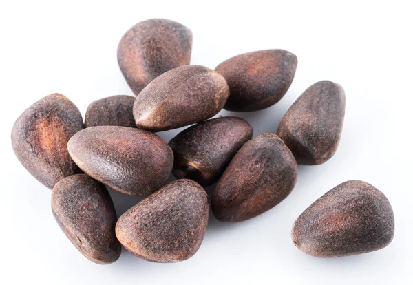 Pinos sin cáscara en el fondo blanco. Alimentos ecológicos . —  Fotos de Stock