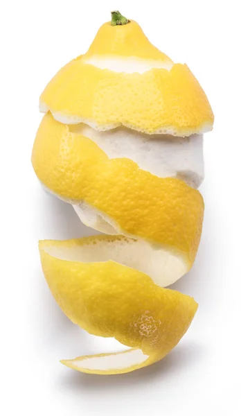 Peeled lemon and lemon zest on white background. Close-up. — Stock Photo, Image