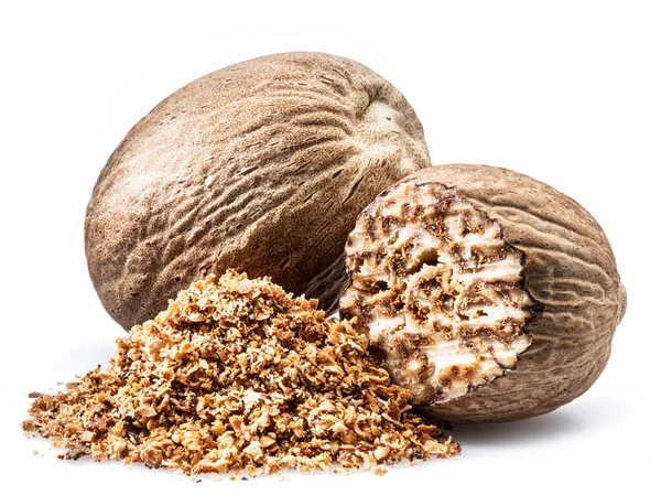 Dried seeds of fragrant nutmeg and grated nutmeg  isolated on wh — Stock Photo, Image