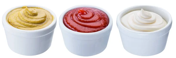 Majonézy, hořčičné a rajčatové omáčky v bílých miskách. Oříznutí p — Stock fotografie
