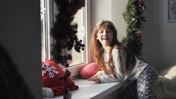 Kid Girl Having Fun near Windowsill — Stock Video