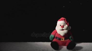 Santa Claus oyuncakla yağan kar