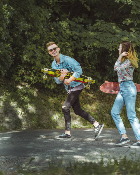 Hipster Couple with Boards