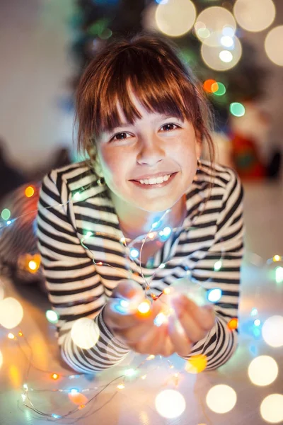 Girl with Christmas Garland