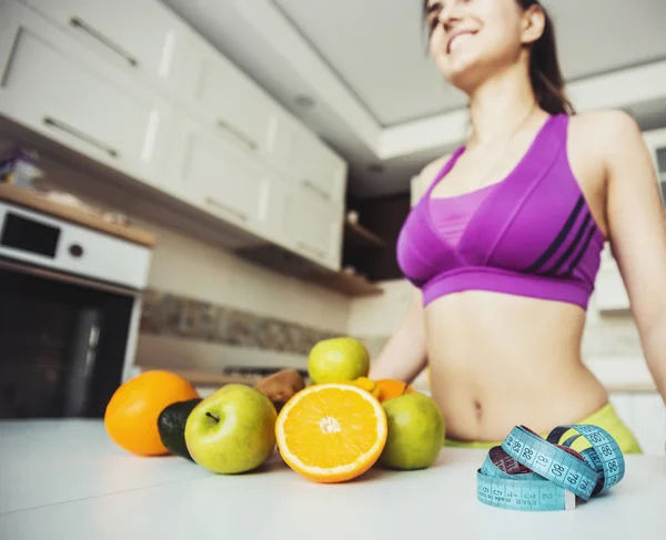 Fitness Girl on the Kitchen — Stock Photo, Image